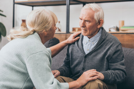 Retired Couple Holding Hands Understanding Dementia in Seniors