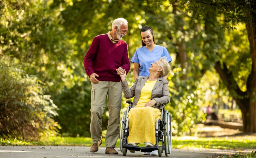 Elderly couple with caregiver for respite care for seniors.