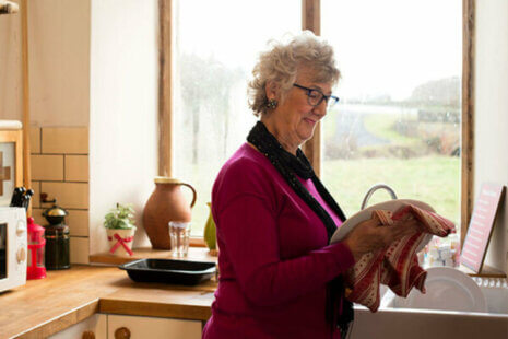 senior-lady-doing-dishes