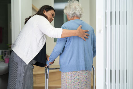 caregiver-encouraging-senior-lady