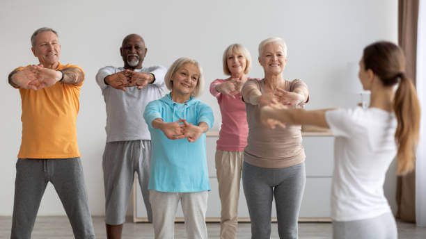 Elderly individuals engaging in physical exercise to promote health and wellness.
