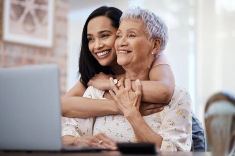 A woman spending quality time with her elderly mother, highlighting the importance of senior care.