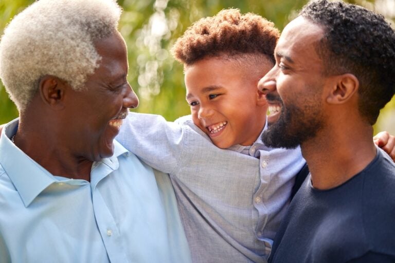 A sandwich generation caregiver helping an aging parent and a child at the same time